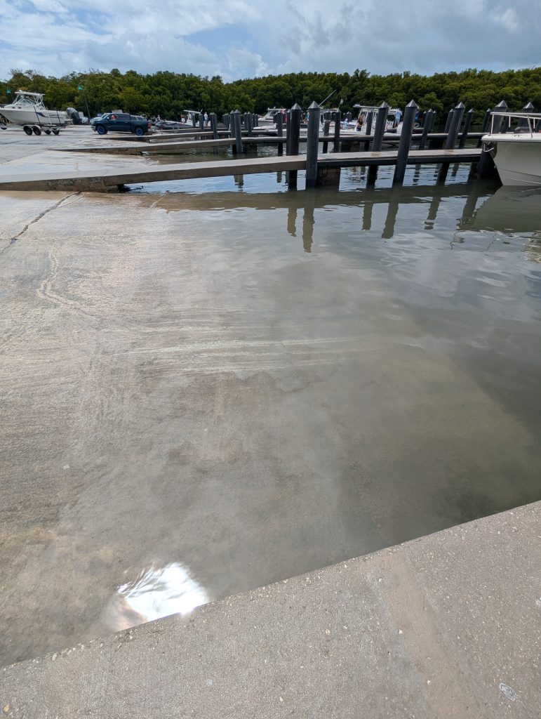 Close-up of Crandon Marina boat ramp traction surface under water